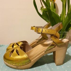 Maguba Swedish golden clogs.